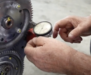 Technician Uses A Starrett Dial Indicator To Measure The Backlash Between The Gears